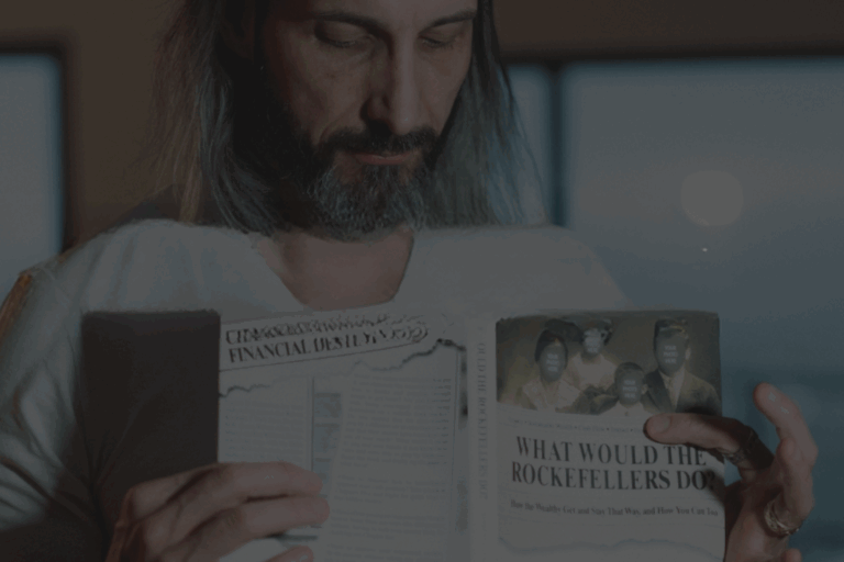 Garrett Gunderson reading "What Would the Rockefellers Do?"
